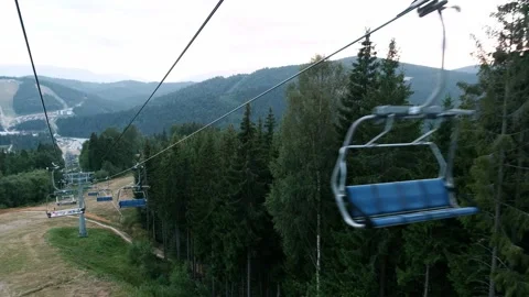 Scenic landscape in the mountains. Riding down the hill in a cable car Stock Footage 148652722