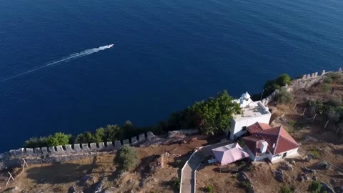 Scenic lighthouse to the deep blue sea Stock Footage 195037403