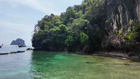 Scenic limestone cliff and emerald green water Paradise Lao Lading island Krabi 動画素材 335325142