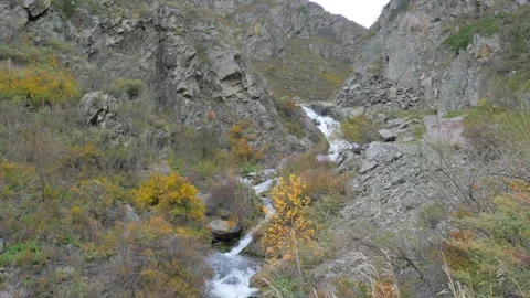 Scenic mountain gorge with a waterfall. Stock Footage 322899028