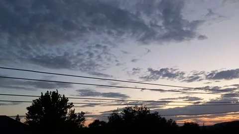 Scenic Mountain Range Horizon at Evening Twilight over Rural Houses Stock Footage 344168431