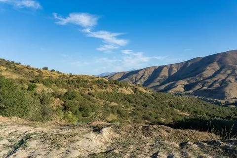 Scenic mountain range landscape under clear blue sky 写真素材