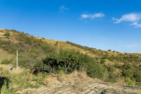 Scenic mountain range landscape under clear blue sky 스톡 사진