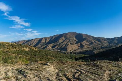 Scenic mountain range landscape under clear blue sky Fotos Stock