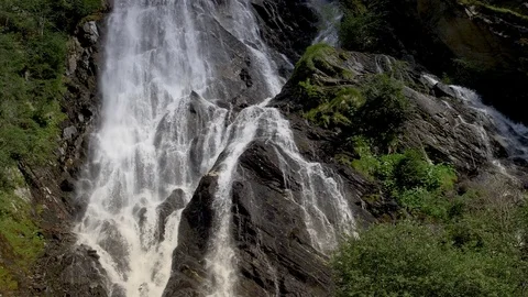 Scenic Mountain River in Slow Motion. Scenic Alpine Waterfall Closeup. Stock Footage