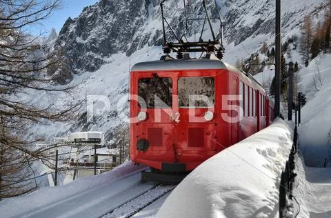 Scenic mountain train in snow Stock Photos