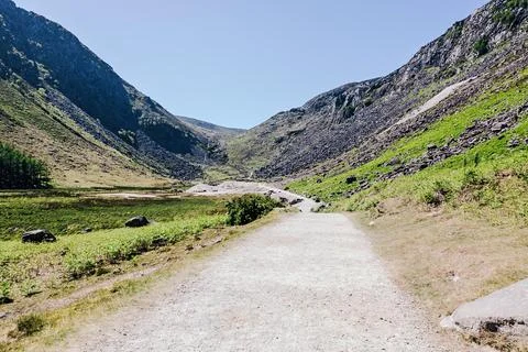 Scenic Mountain Valley Pathway Stock Photos