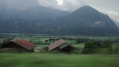Scenic mountain valley view from a moving car in the Italian Alps 库存影片 317254249