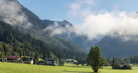 Scenic mountain view of the austrian alps in 4k. Time lapse of clouds. Stock Footage 252665087
