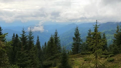 Scenic Mountain View with Clouds Moving Across the Peaks Stock Footage 290899613