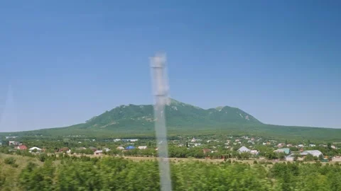 Scenic Mountain View from Moving Car Window Driving Past Countryside Landscape Stock Footage 338238617