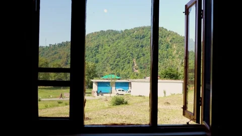 Scenic mountain view from an open window Stock Footage 340187088