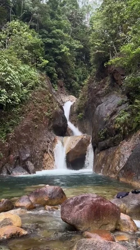 Scenic Mountain Waterfall Flowing Into Crystal Pool Video stock 341268626