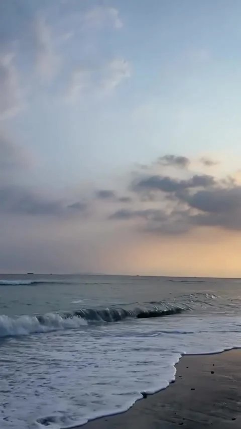 Scenic Ocean Beach Sunset with Gentle Waves Stock Footage 341317293