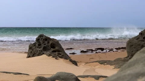 Scenic Ocean View from the Beach with Rocks and Sand 스톡 동영상 147985113