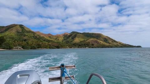 Scenic ocean view from boat of the rugged tropical island Kadavu in Fiji, South Stock Footage 345052939