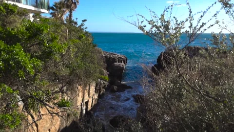 Scenic Ocean View With Rocky Cliffs in Cascais, Portugal Stock Footage 332629079