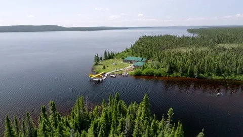 Scenic Overview of Secluded Camp in Canada with Beaver Seaplane at Dock Stock Footage 250226875