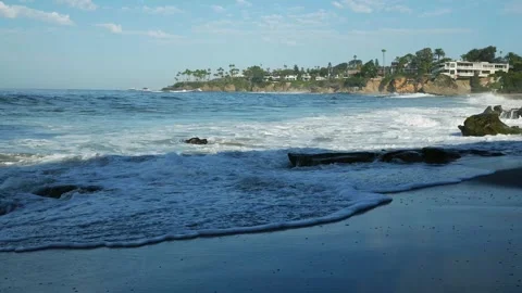 Scenic Pacific Ocean Waves with a Glimpse of Divers Cove on the Horizon 動画素材 251845392