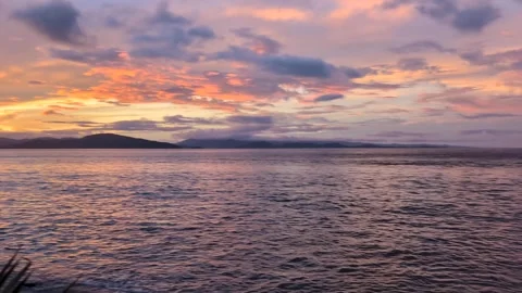 Scenic pan sunset sky ocean view overlooking Somosomo strait and Vanua Levu Stock Footage 346681916