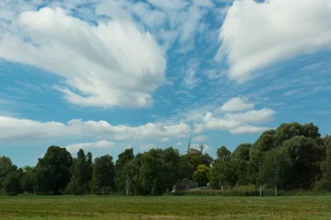 Scenic panorama with windmill Stock Photos