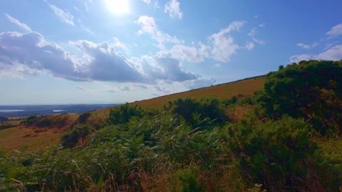 Scenic panoramic view of countryside valley and blue sky in Ireland Stock Footage 340435542