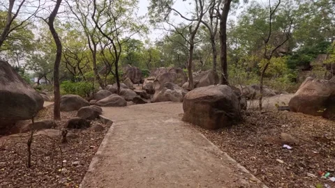Scenic Pathway Through Rocky Landscape at Mama Vagne Pahar - Birbhum, WB Vídeos de archivo 343734880