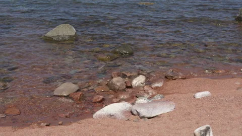 Scenic pebble and sand beach on the southern shore of Lake Issyk-Kul Stock Footage 342024874