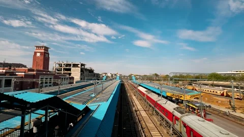 A Scenic Perspective of a Modern Train Station Featuring Vibrant Tracks and Stru 库存影片 335203428