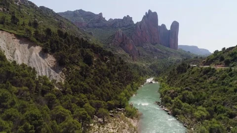 Scenic river and mountain views in a peaceful valley setting 스톡 동영상 320293394