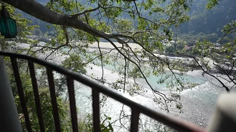 Scenic river flowing through a lush valley viewed from above Vídeo Stock 335270770