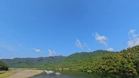 Scenic River Surrounded by Mountains and Trees Stock Footage 339041369