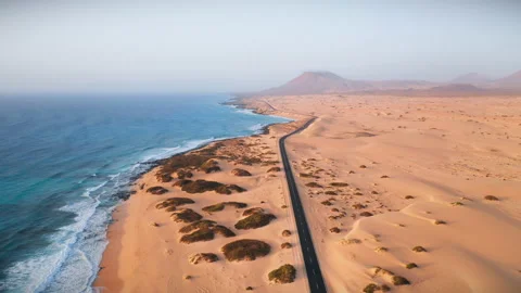 Scenic Road Between Ocean And Dunes Stock Footage 201940674