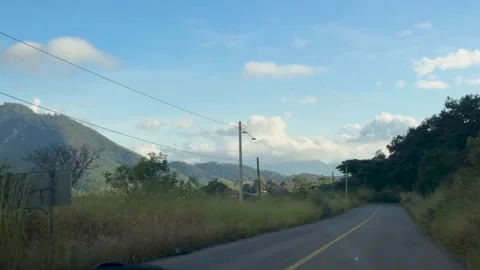 Scenic Road with Mountain View Stock Footage 296353772