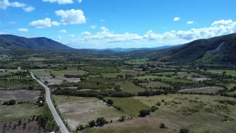 Scenic Road Through Valleys and Hills Stock Footage 306893365