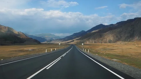 Scenic road trip through mountain valley Stock Footage 313212951
