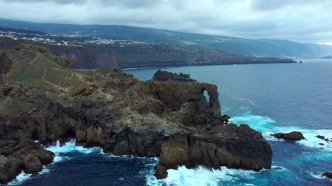 Scenic rock with ocean's waves Stock Footage 138692687