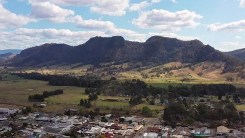 Scenic rocky mountain range at Gloucester town of Australia aerial landing 4k. Stock Footage 251832172