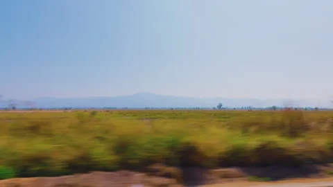 Scenic Rural Fields and Mountains Landscape in Chiang Rai Thailand Stock Footage 342336703