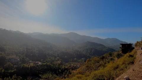 Scenic shot of  Clouds Mountains Rain Stock Footage 123830802