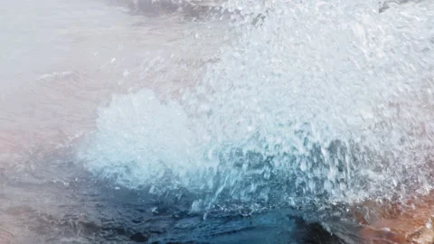 Scenic slow motion of active hot geyser in Yellowstone National park volcano 4K Stockbeeldmateriaal 161292182