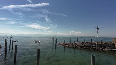 Scenic summer view of Lake Constance with distant mountains and calm water Stock Footage 339340540