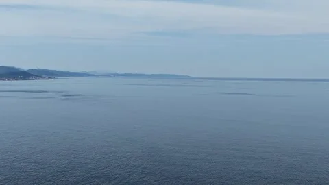Scenic Sunlight Shimmering across the Open East Sea, Aerial View Stock Footage 344778564