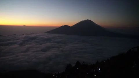 Scenic sunrise view above clouds at mount batur bali Stock-Footage 330767696