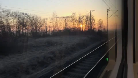 Scenic Sunrise View from Train Window Stock Footage 333351020