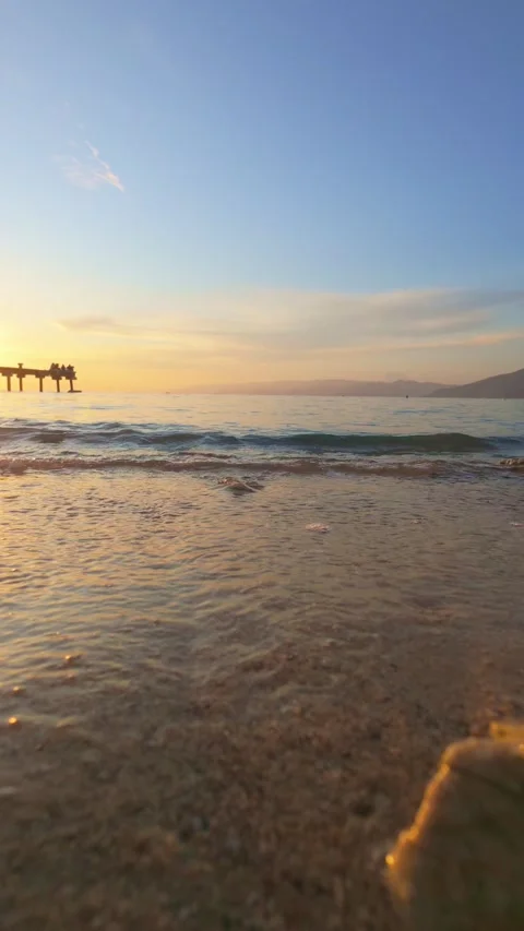 Scenic Sunset at Beach with Pier Stock Footage 305977979