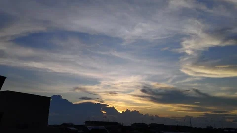 Scenic Sunset with Colorful Clouds Over Urban Skyline Stock Footage 309840571