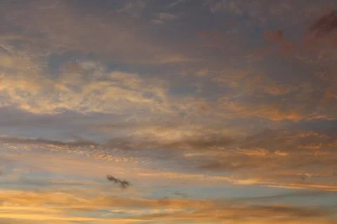 Scenic Sunset Dramatic Sky with Fluffy Orange Pink Clouds Stock Photos