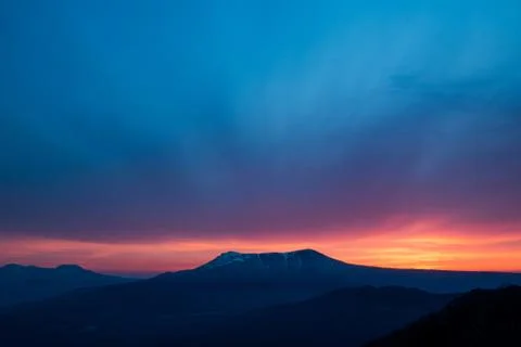 Scenic sunset in the mountains Stock Photos