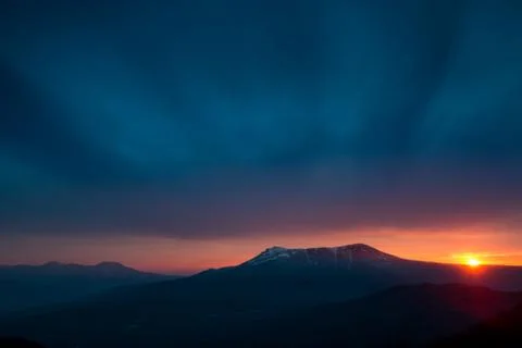 Scenic sunset in the mountains Stock Photos